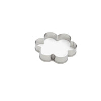 An individual round-shaped stainless steel cookie cutter, showcasing its smooth edge.