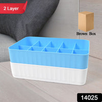 Close-up of a compact drawer organiser with individual compartments for socks and undergarments.