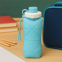 Foldable silicone water bottle compactly stored for outdoor use